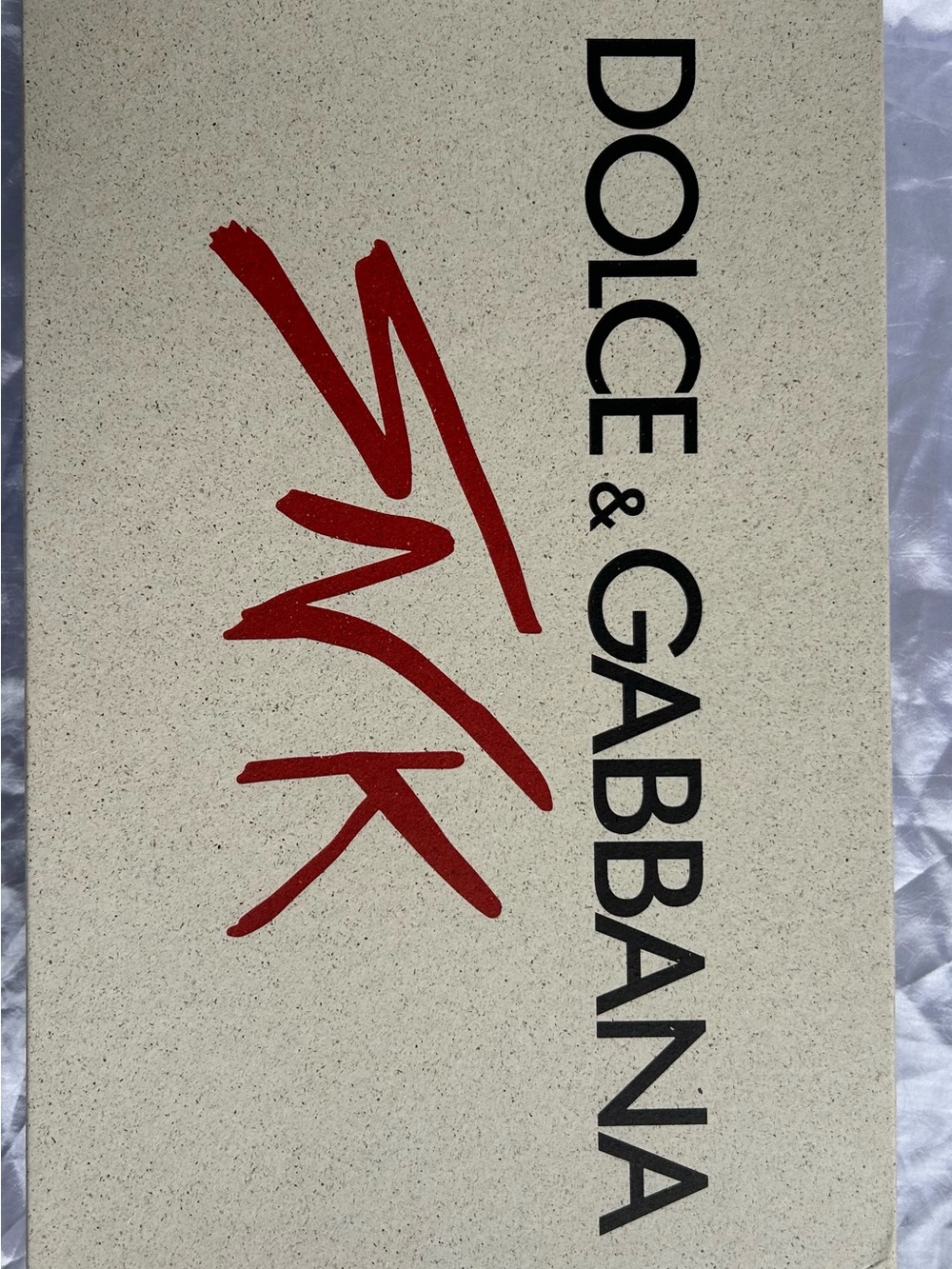 Dolce & Gabbana Cream Box with Red Signature and Black Lettering